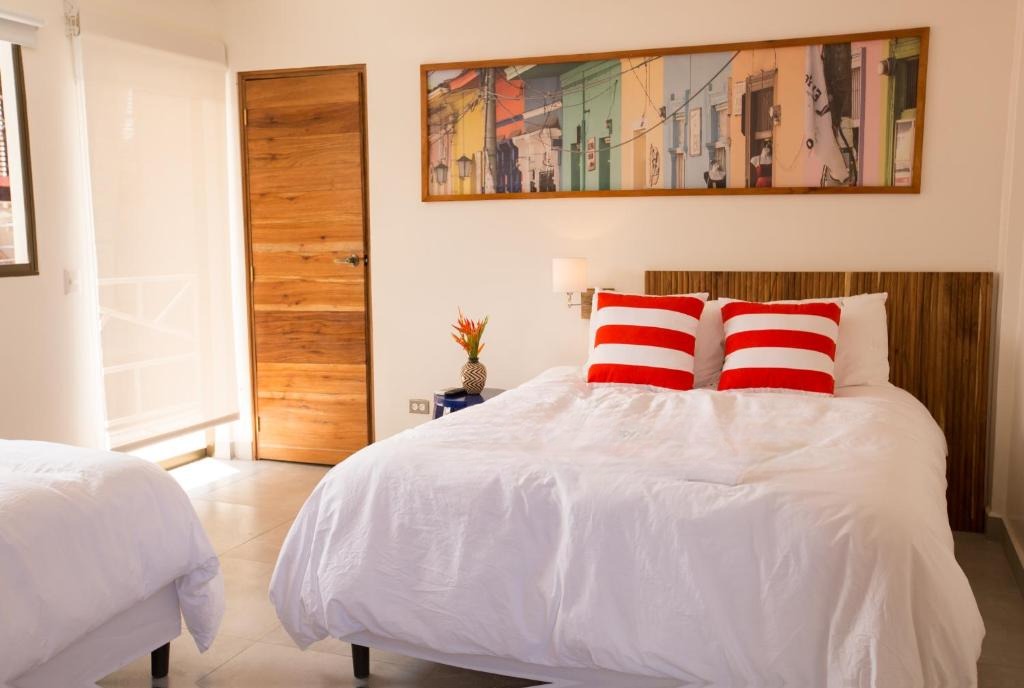 Habitaciones y espacios comunes El Caite Hotel 1