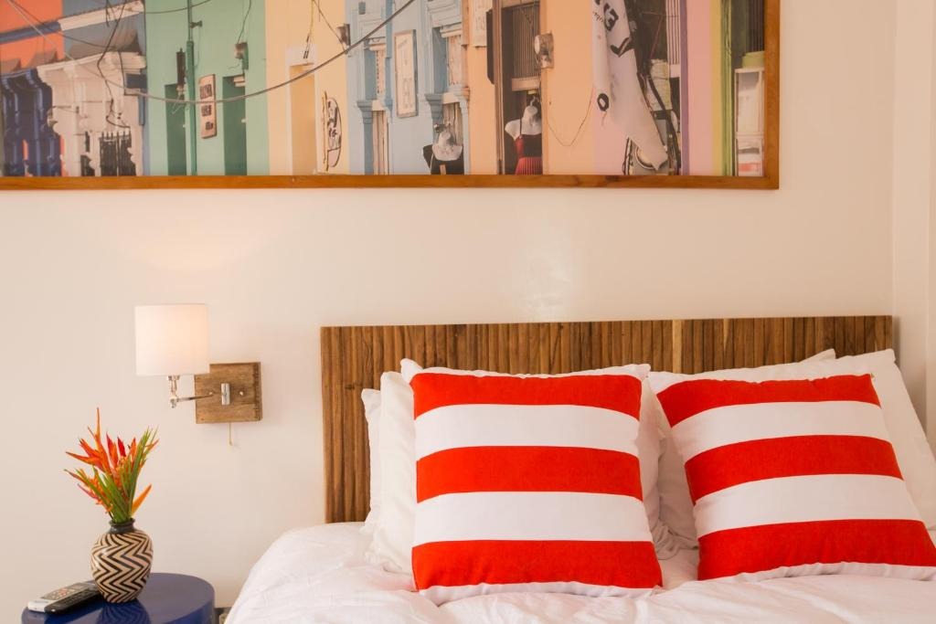 Habitaciones y espacios comunes El Caite Hotel 3